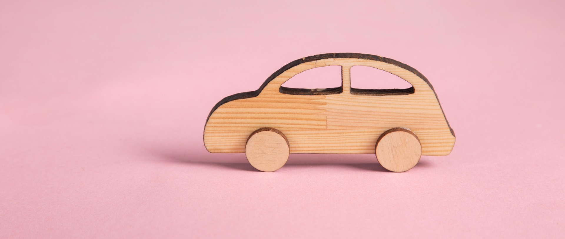 wooden car to remind people of personal property tax returns.